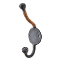 LOKE Krok i svart järn med rottinglindad arm och oval bakplatta, höjd 13 cm